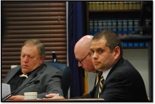 Rep. Chris Tuck joins Speaker of the House Rep. Mike Chenault and House Majority Leader Rep. Alan Austerman in a Rules Committee meeting where contentious bills are often hashed out.