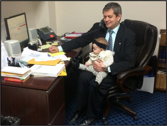 Rep. Tuck and his daughter Penelope check in with folks back home from his office in the State Capitol.