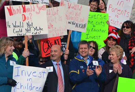 Representative Chris Tuck, in Kuspuk, recently joined concerned parents and other legislators to rally for education on the steps of the State Capitol.