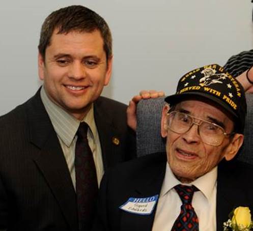 Above: Representative Chris Tuck at a 2009 meeting with Alaska Territorial Guard hero Sigurd Edwards.