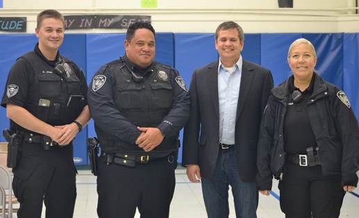 Rep. Tuck invited Anchorage Police Officers to join him at a neighborhood crime meeting.