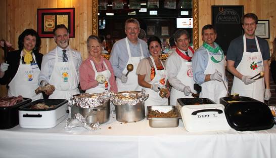 Rep. Tuck (second from right) volunteered with other legislators at the Thanksgiving in March fundraising event.