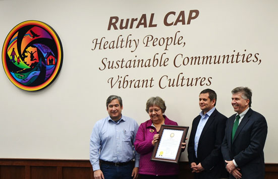 Above left to right: Rep Sam Kito III, Board President Jackie Dailey, Rep. Chris Tuck, and Executive Director David Hardenbergh honor the 50thAnniversary of the Rural Alaska Community Action Program?s service to our State.