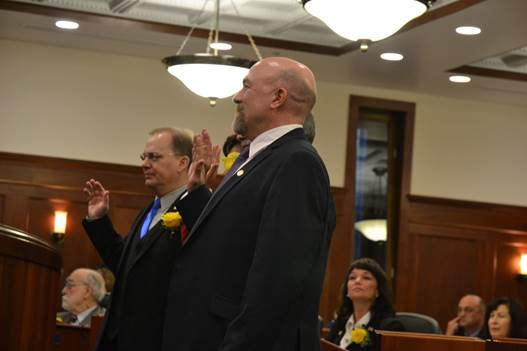 Representative Wool taking the oath of office