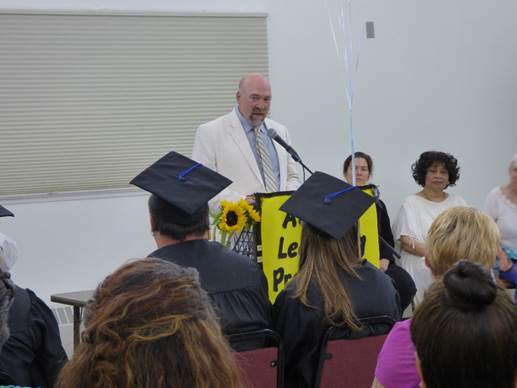 Representative Wool speaking at the Adult Learning Programs of Alaska graduation ceremony earlier this summer